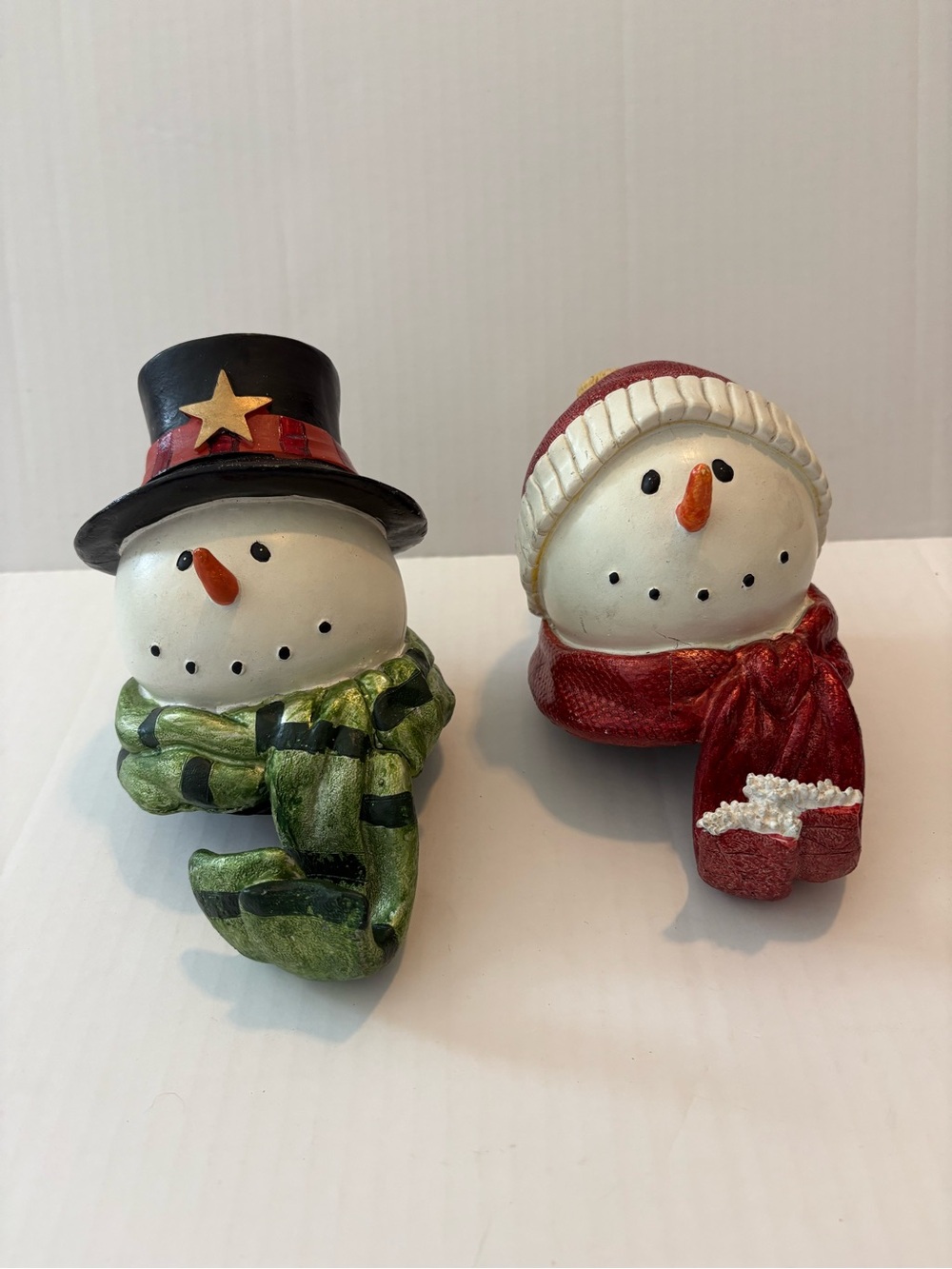 2 snowman stocking hooks